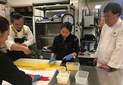 Le Cordon Bleu students work alongside some top chefs