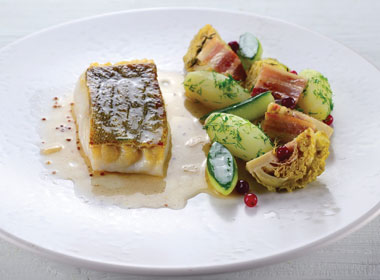 Norwegian cod with cabbage, lingonberries and dill pickled cucumbers