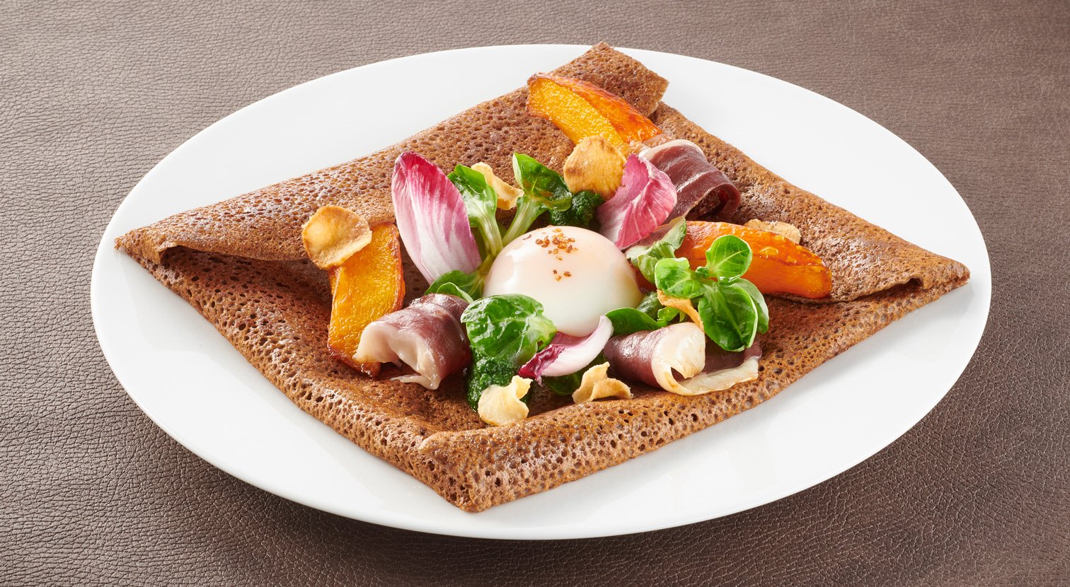 Buckwheat galette, perfect egg, smoked duck breast, pumpkin horns and Jerusalem artichoke chips